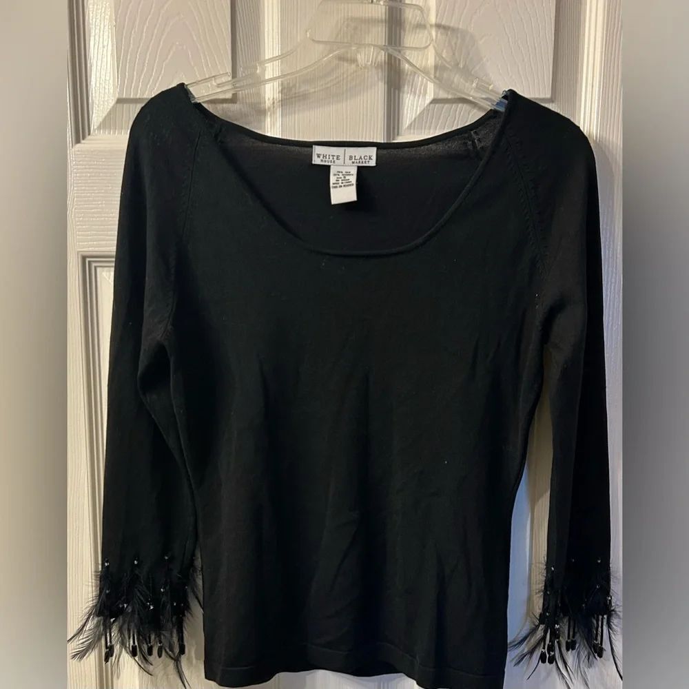Black long sleeve shirt with feathers end of sleeve size S